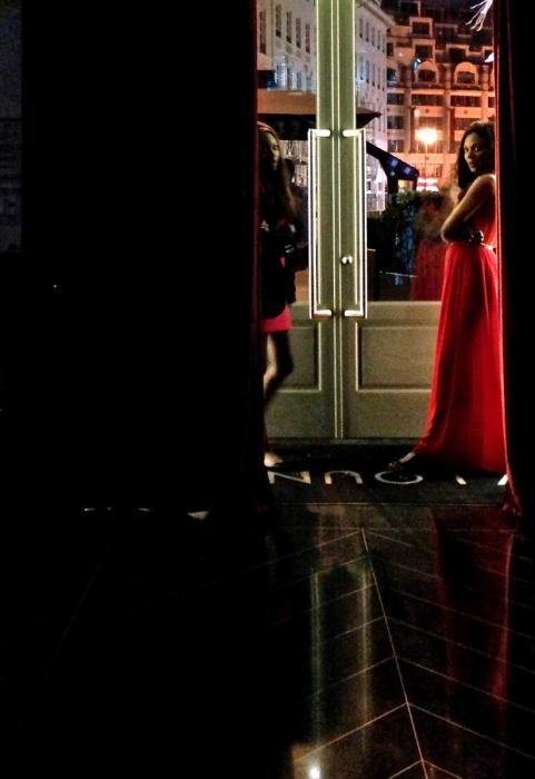 Woman in Red Chiffon, Boulevard des Capucines. Photograph by Dan Mangan